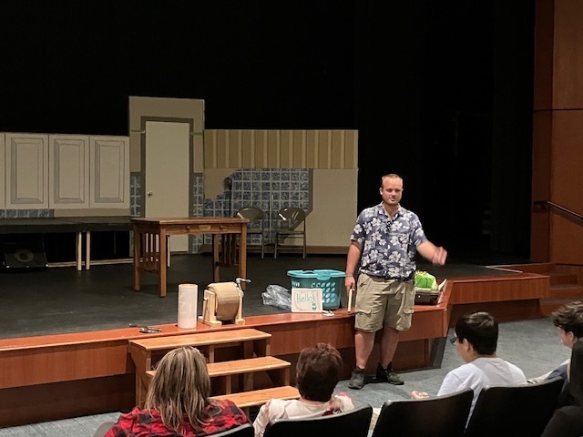 Presenter Billy Deardoff demonstrates Foley Artistry to One Act Students