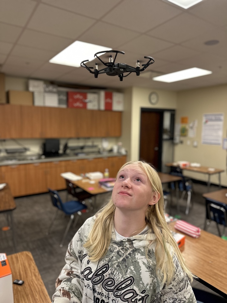 student with drone