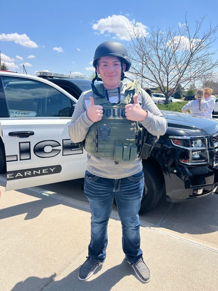 student in SWAT vest