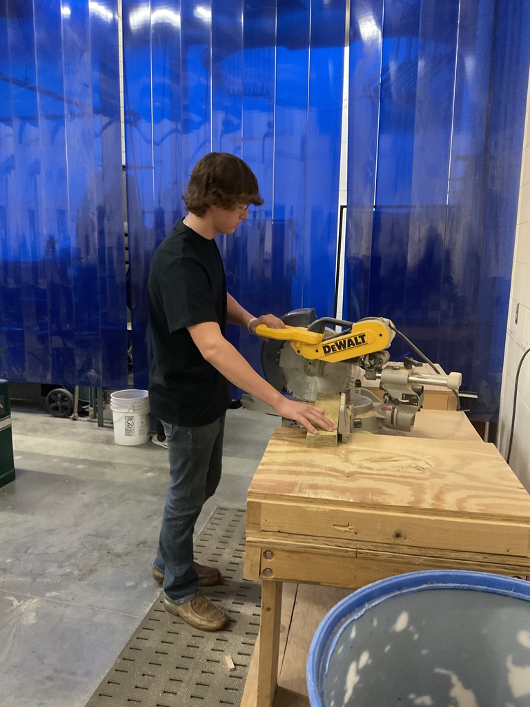 Parker building the Buddy Bench