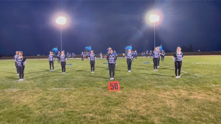 cheerleaders, color guard and band halftime performance