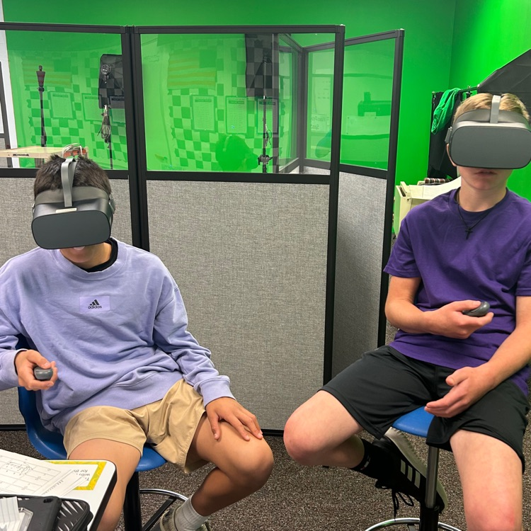 7th Graders enjoying VR.